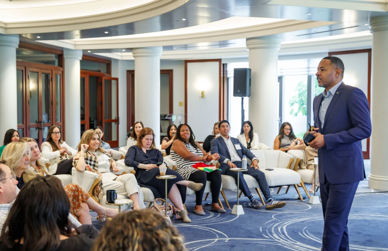 Rob Cook speaking with an attentive workshop audience